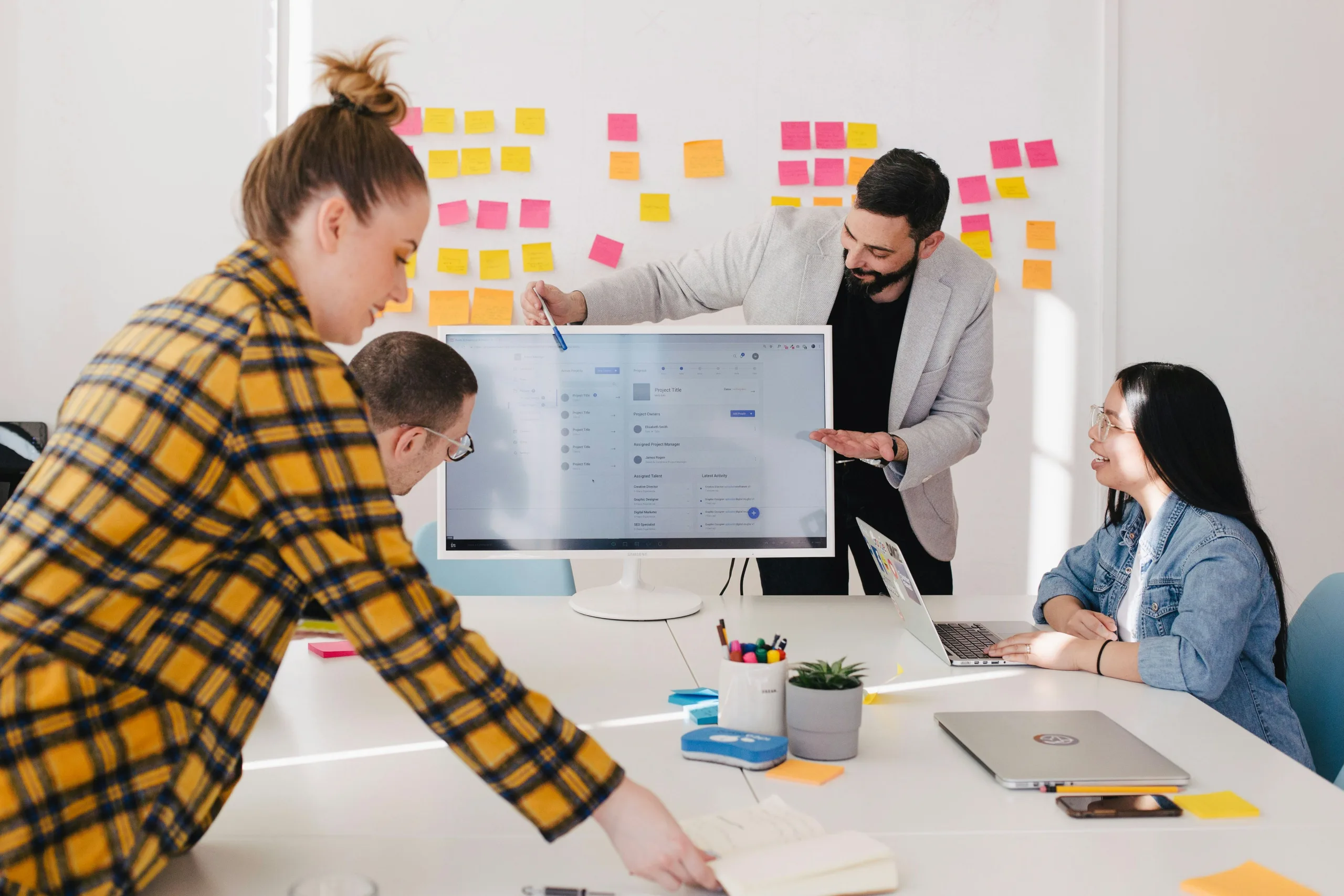 People taking part in a content review meeting